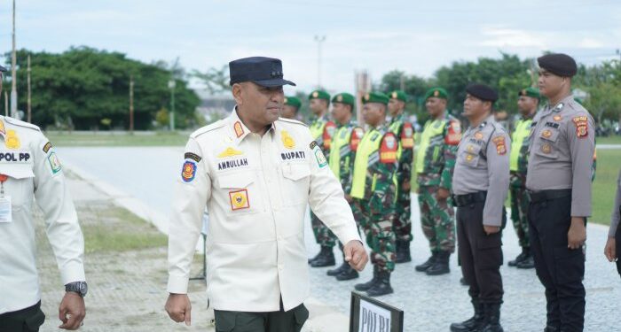 Pemkab Aceh Timur Gelar Upacara Penyerahan Satlinmas PAM TPS