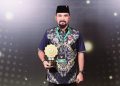 Bupati Al Farlaky Terima UHC Award 2026 dari BPJS Kesehatan