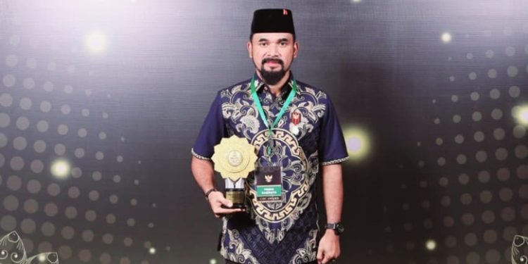 Bupati Al Farlaky Terima UHC Award 2026 dari BPJS Kesehatan