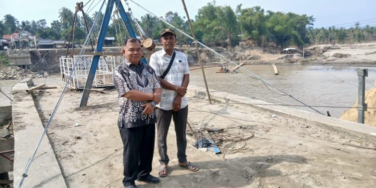 Dampak Banjir BandangMasyarakat Minta Pemerintah Segera Bangun Jembatan Putus
